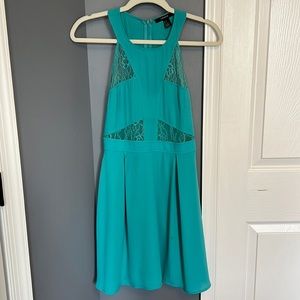 Teal lace cutout dress